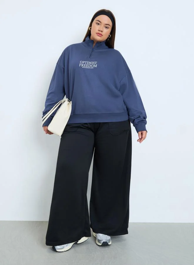 Styli Plus Size Regular Fit Slogan Half-Zip Sweatshirt