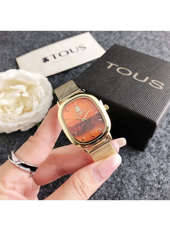 TOUS Oval Dial Watch with Sunset Scene and Golden Mesh Band