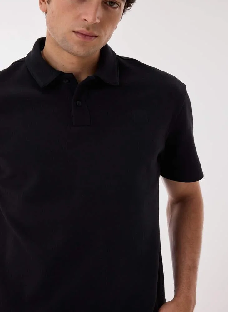 Ashita Fernandes  Malvior Men’s Black Fitted Polo Shirt – Cotton Blend Solid Collared Neck T-Shirt | Lightweight Waist Length Slip-On Smart Casual Tee for Men | Best Price UAE