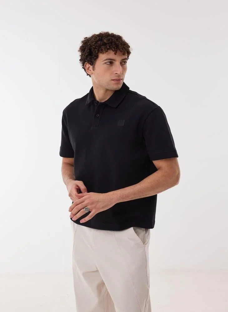 Ashita Fernandes  Malvior Men’s Black Fitted Polo Shirt – Cotton Blend Solid Collared Neck T-Shirt | Lightweight Waist Length Slip-On Smart Casual Tee for Men | Best Price UAE