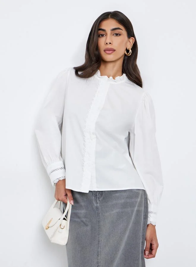 ستايلي قميص بأكمام طويلة وحواف مكشكشة