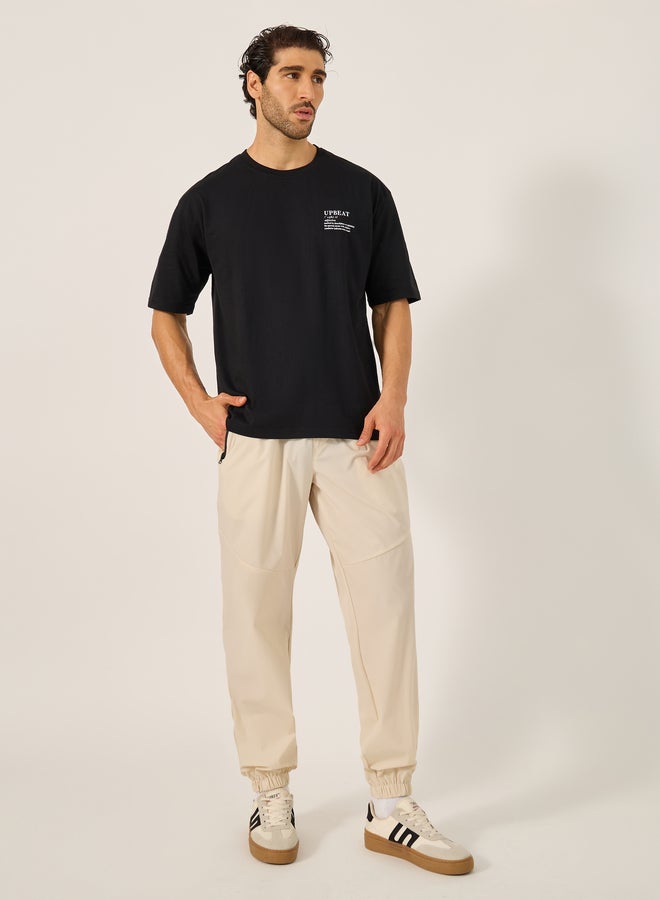 Styli Solid Relaxed Fit Elasticated Cuff Joggers with Contrast Zip detail  - Image 2
