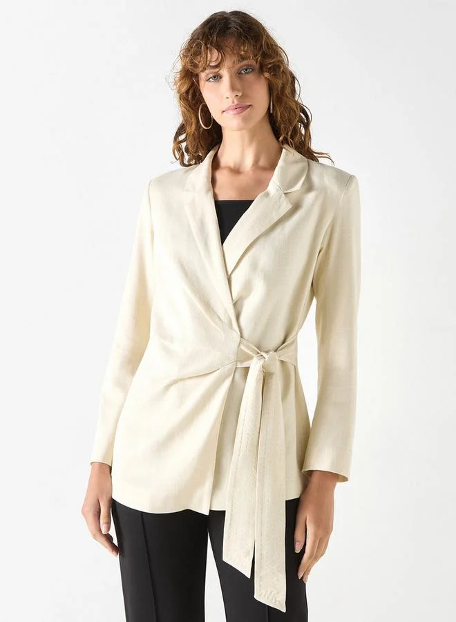 Iconic Textured Wrap Jacket with Notched Lapel and Tie-Up Detail