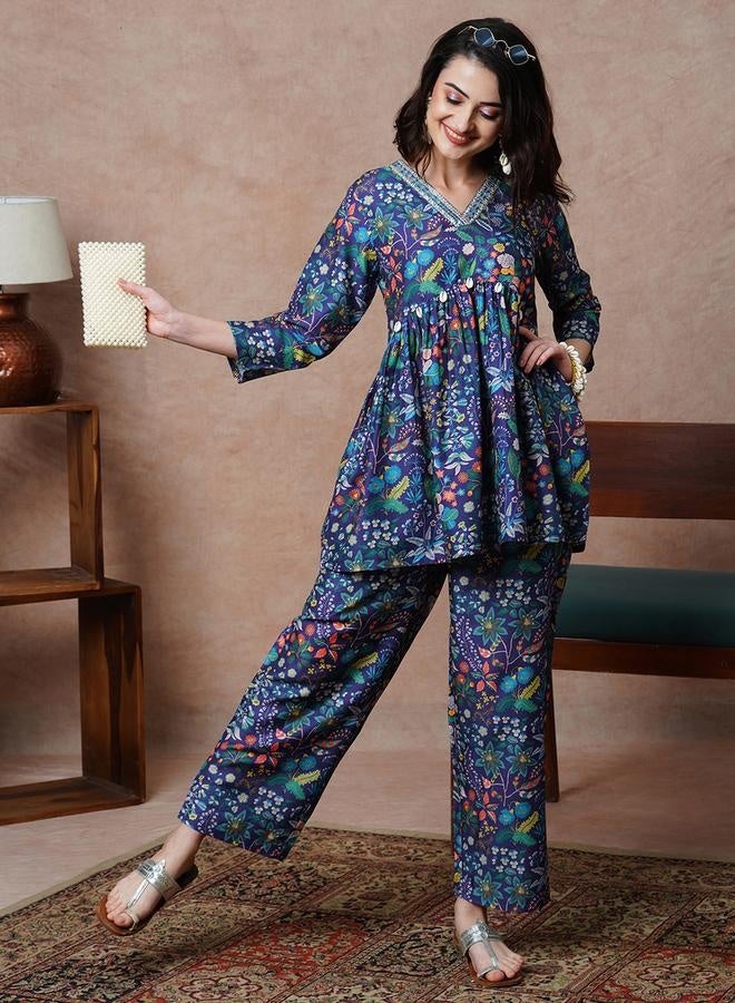 globus Globus Women Purple Printed Alia Cut Peplum Tunic & Straight Pants Co-Ord Set by Styli - Image 1