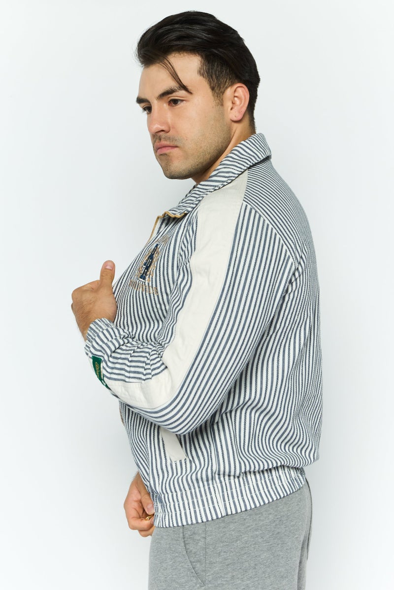 PUMA جاكيت رياضي للرجال بأكمام طويلة مناسب للخارج، أزرق داكن - Image 3