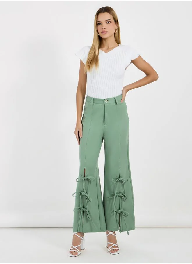 Styli High Rise Split Hem Wide Leg Knotted Pants