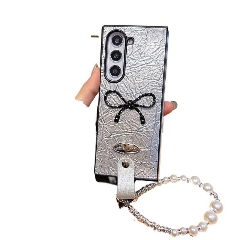 غطاء واقي بملمس باللون Polka Dot Bow جلد لـ OPPO Find N3 Flip مع حماية من السقوط وتصميم قابل للطي مع مقاوم للصدمات مع تصميم فيونكة مع متوافق مع حبل اليد للتنقل اليومي سهل التخزين - Image 1