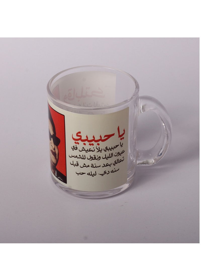 Story Of Candle A transparent glass cup printed with the design of “Umm Kulthum” and one of her sweetest songs  - Image 1