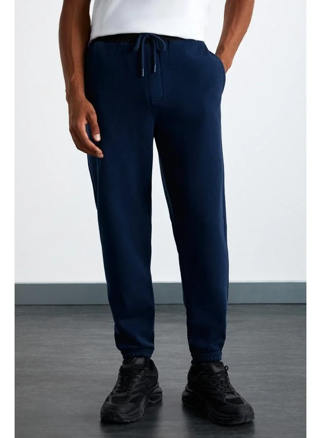 GRIMELANGE Ludwig Men's Organic Cotton Fabric Parachute Zipper Pocket Lined Sweatpants.