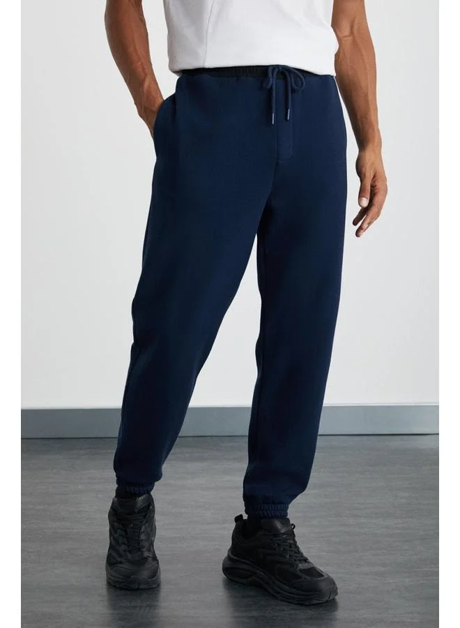 GRIMELANGE Ludwig Men's Organic Cotton Fabric Parachute Zipper Pocket Lined Sweatpants.