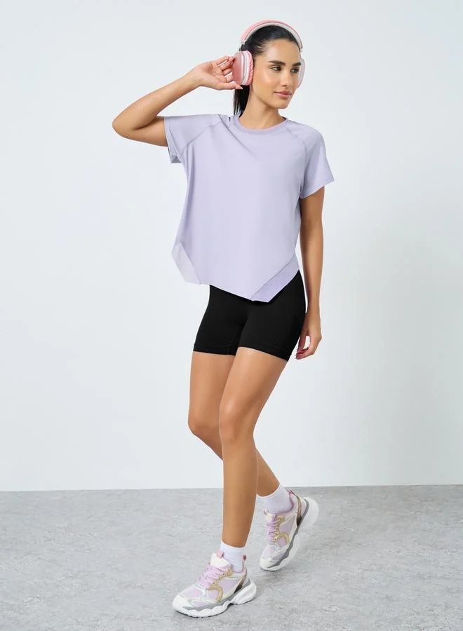 ستايلي اكتيف بلوزة بقصة سائبة وتداخلات شبكية