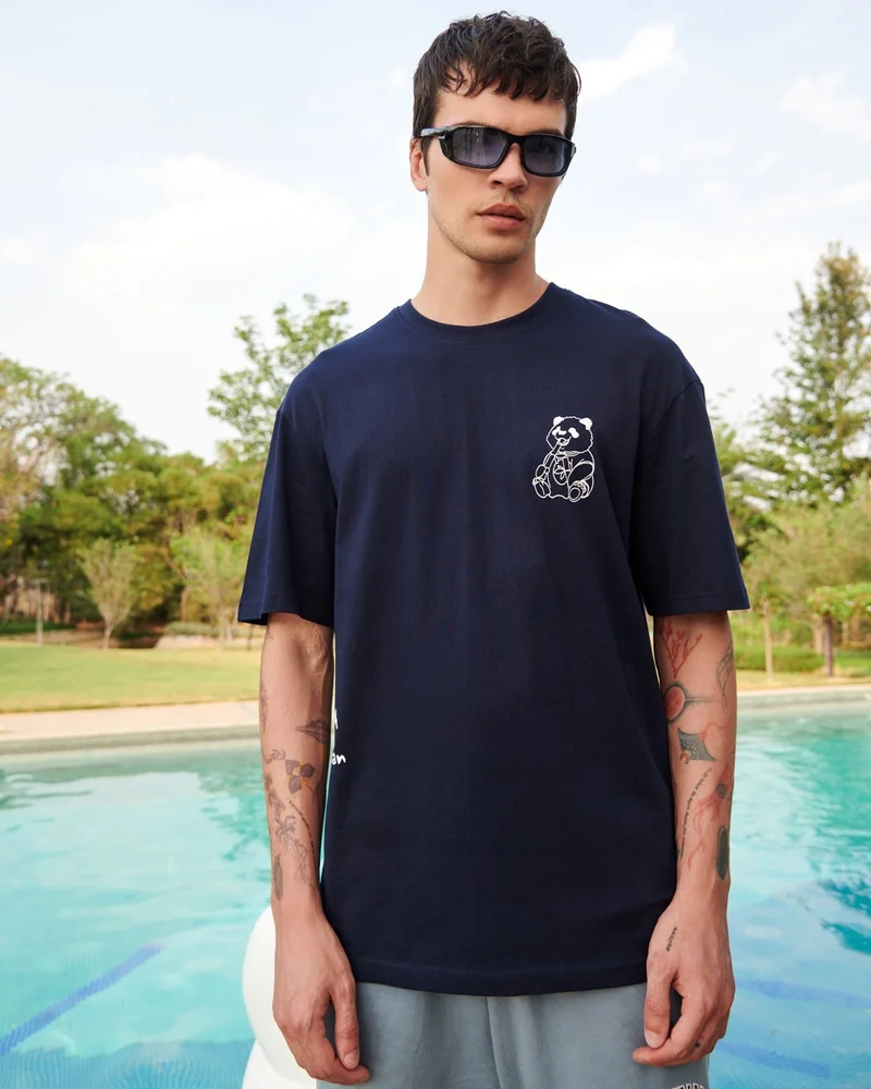 بيواكوف تيشيرت رجالي أزرق بطبعة باندا واسع