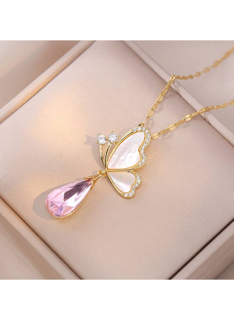 Generic - An elegant golden stainless steel necklace with a butterfly design, embellished with a pink teardrop-shaped crystal, sparkling stones, and a golden frame. A delicate piece that adds a touch of femininity and beauty, perfect for adding elegance to your look. - Image 1