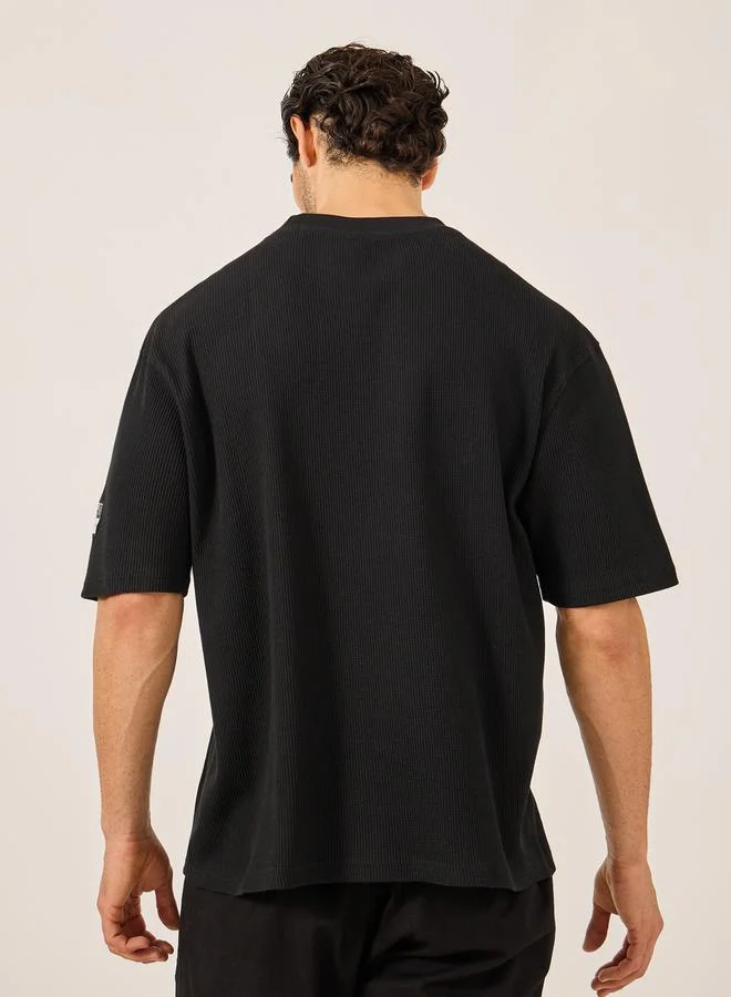 Styli Waffle Knit Oversized T-Shirt with Sleeve Badge Detail