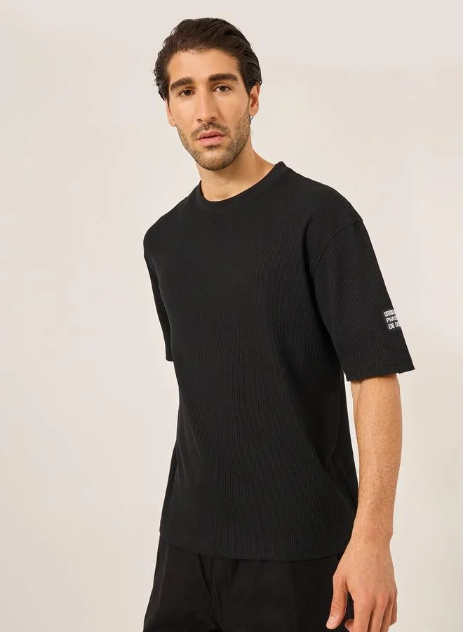 Styli Waffle Knit Oversized T-Shirt with Sleeve Badge Detail
