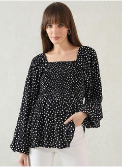 Femmella All-Over Print Smocked Detail Peplum Top by Styli  - Image 1