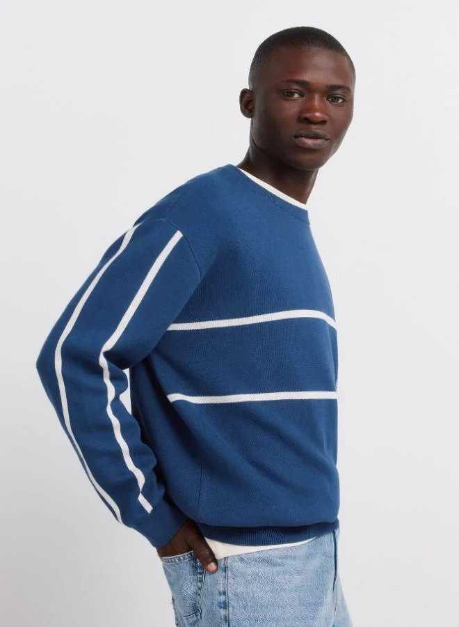 Springfield  100% cotton plain jersey-knit jumper with jacquard positional text, ribbed neck, cuffs and hem for Men | Best Price UAE