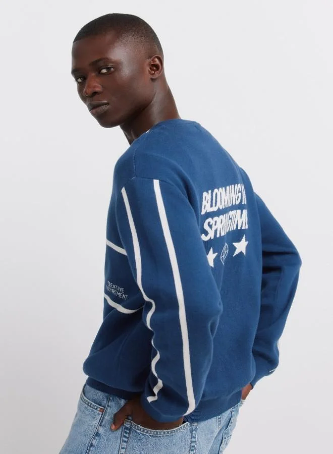 Springfield  100% cotton plain jersey-knit jumper with jacquard positional text, ribbed neck, cuffs and hem for Men | Best Price UAE