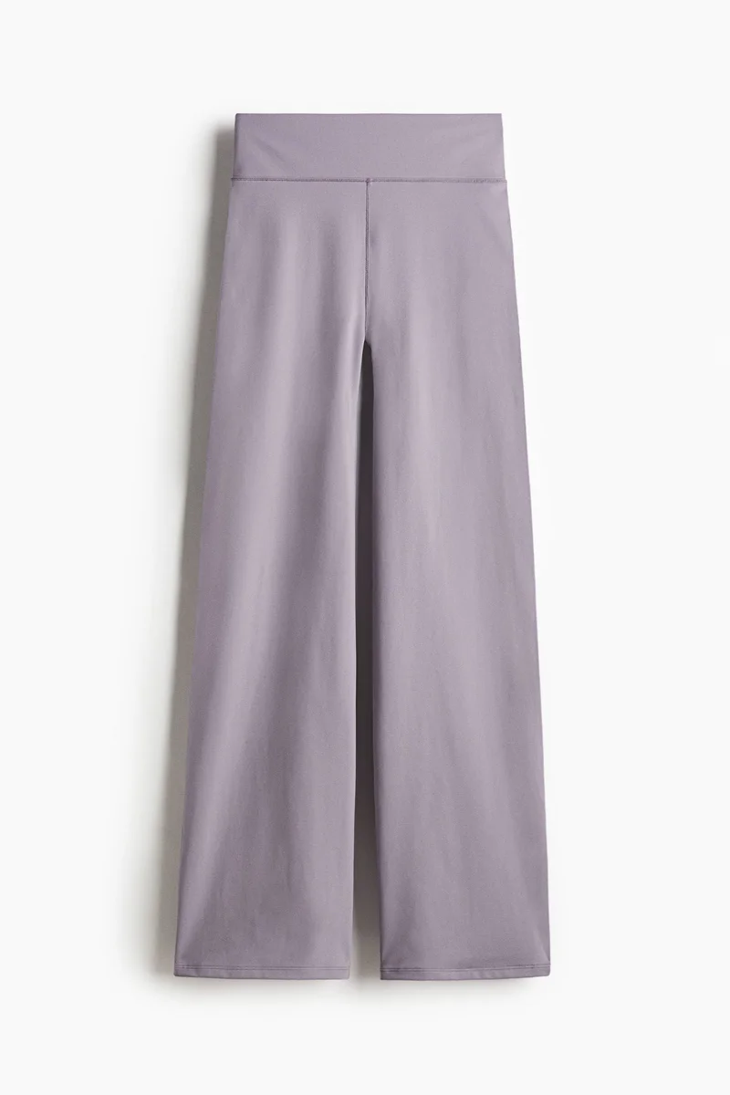 H&M SoftMove™ Flared sports trousers