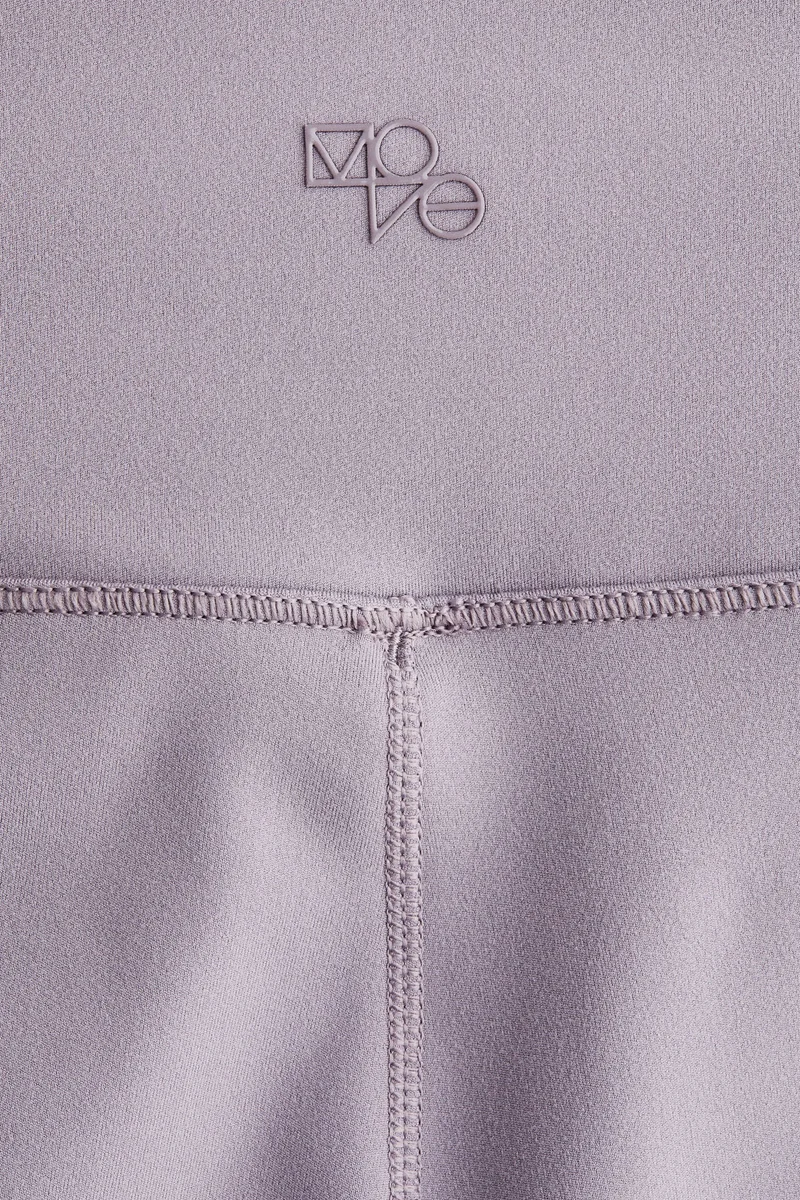 H&M SoftMove™ Flared sports trousers