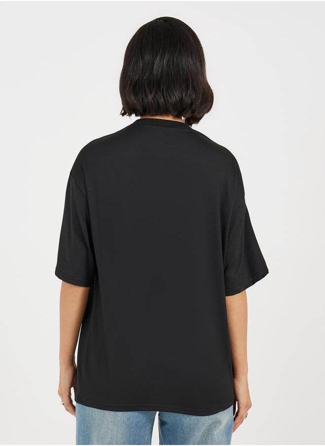 Styli - Oversized Graphic Print Round Neck Longline T-shirt - Image 1