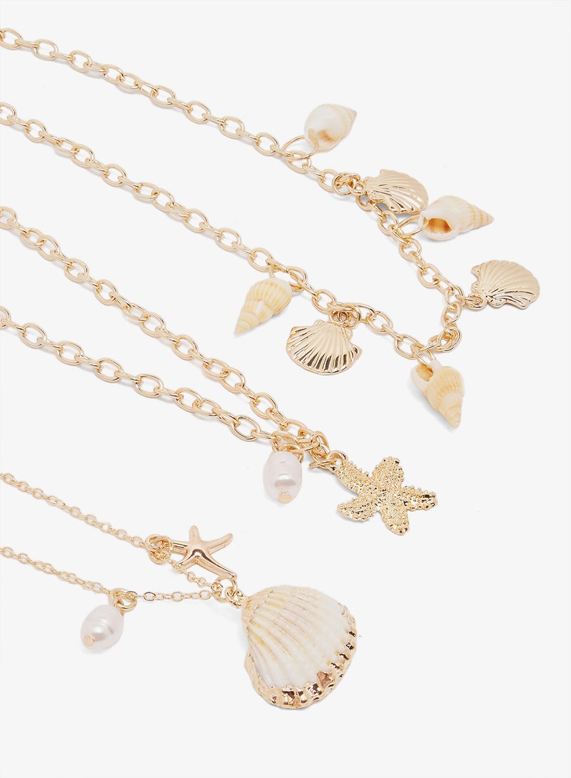 Ginger Beach Inspired Beaded Gold Necklaces - Image 1