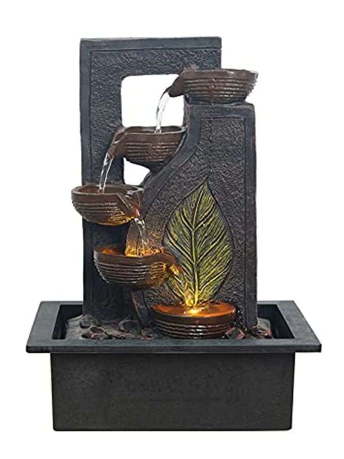POLYRESIN TABLE TOP BLACK 4 DIYA STEPS GREEN LEAF DESIGN INDOOR WATERFALL FOUNTAIN FOR HOME DECOR WITH LED LIGHTS SPEED CONTROLLER PUMP SIZE 40 X 295 X 22CM WEIGHT 2250GRM