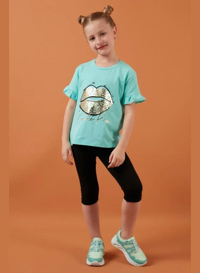 ليلا تيشيرت قطن بطبعات وأكمام مكشكشة ورقبة دائرية للبنات