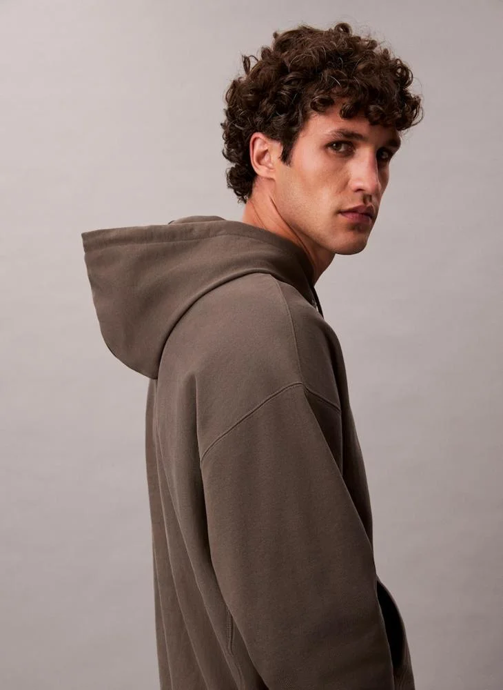 Calvin Klein Jeans  Relaxed Cotton Terry Hoodie for Men | Best Price UAE