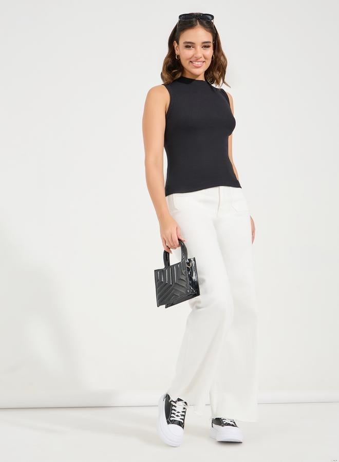 ستايلي بلوزة مضلعة بلا اكمام مع ياقة عالية - Image 2