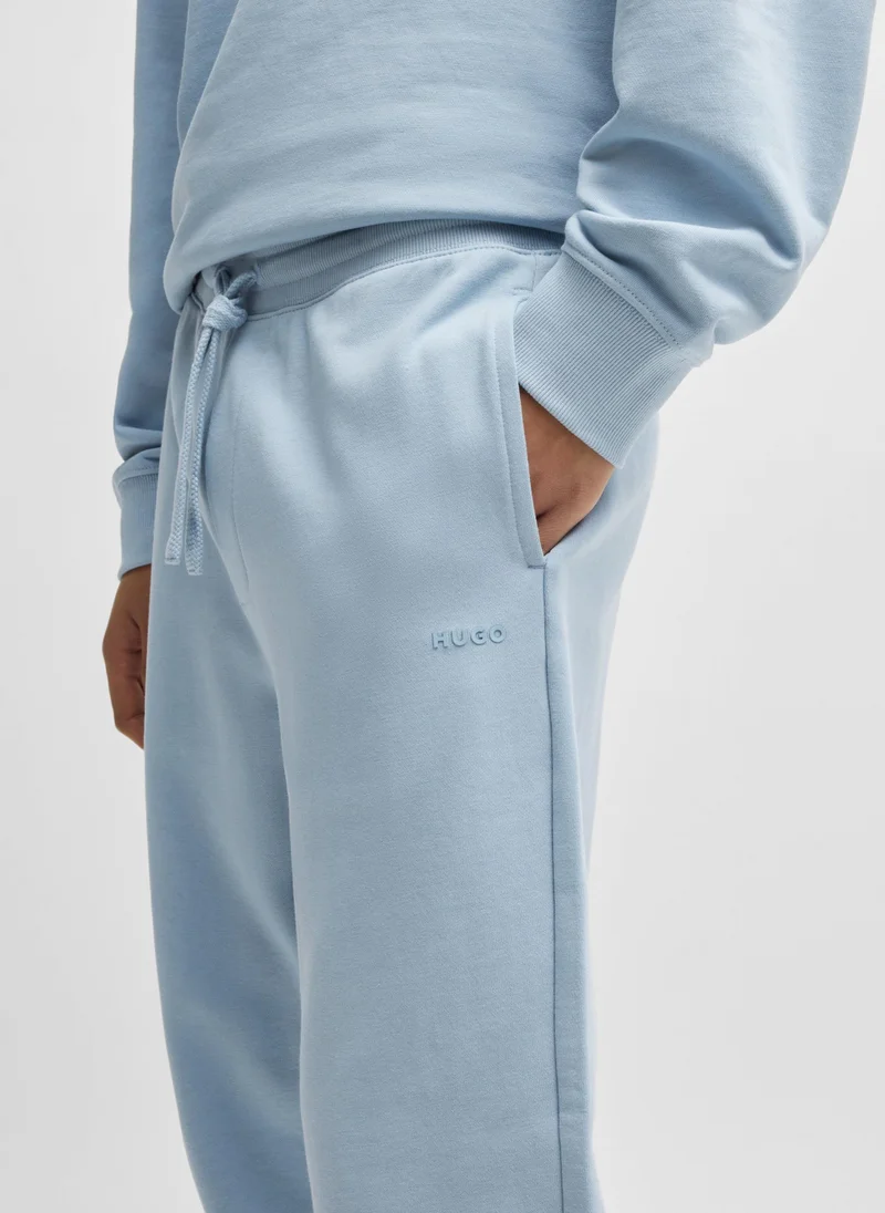 HUGO Cotton-terry tracksuit bottoms with logo print