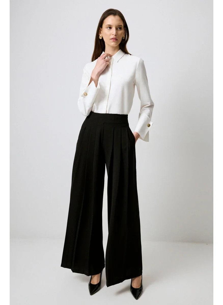 تاتشي Pleated Wide Leg Crepe Trousers