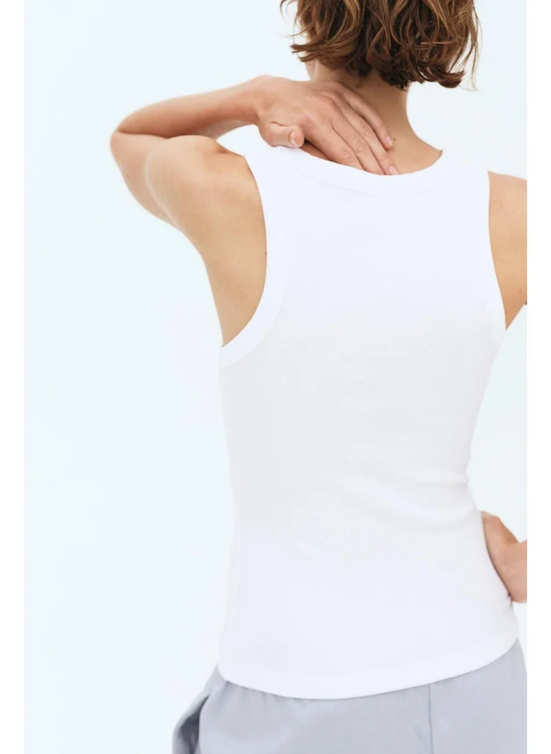 اتش اند ام بلوزة فيست مضلعة