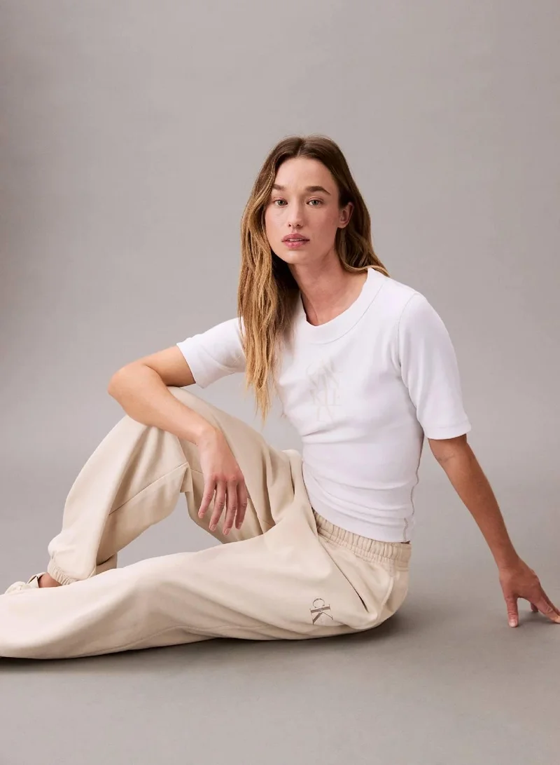 Calvin Klein Jeans Light Hay Monogram Logo French Terry Jogger for Women | Best Price UAE