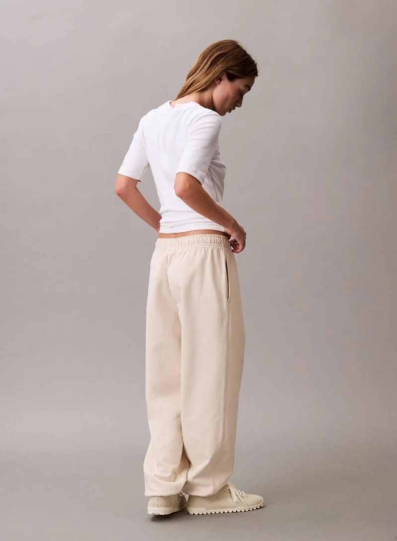 Calvin Klein Jeans Light Hay Monogram Logo French Terry Jogger for Women | Best Price UAE