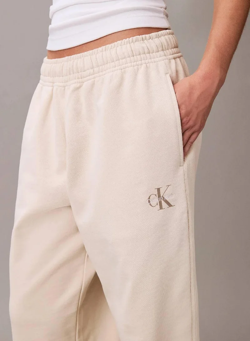 Calvin Klein Jeans Light Hay Monogram Logo French Terry Jogger for Women | Best Price UAE