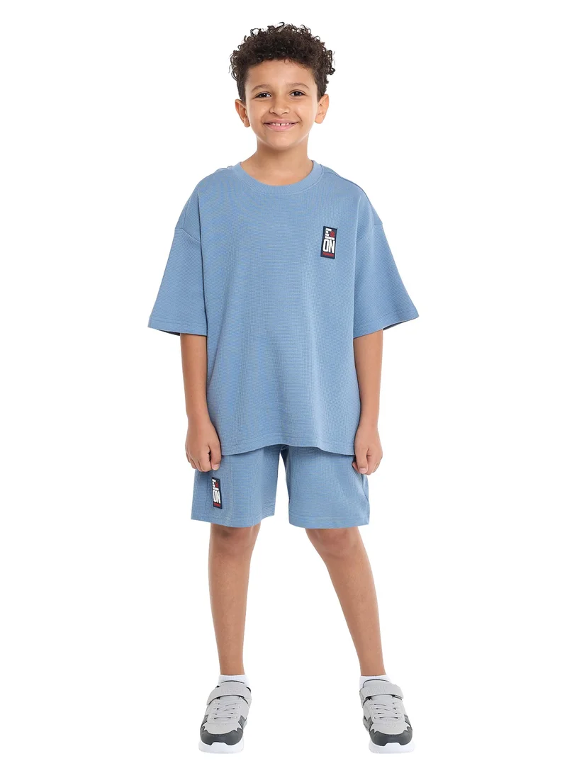 victor and jane Victor and Jane Boys' Cord Set – Light Blue T-Shirt and Shorts Outfit with Label detail