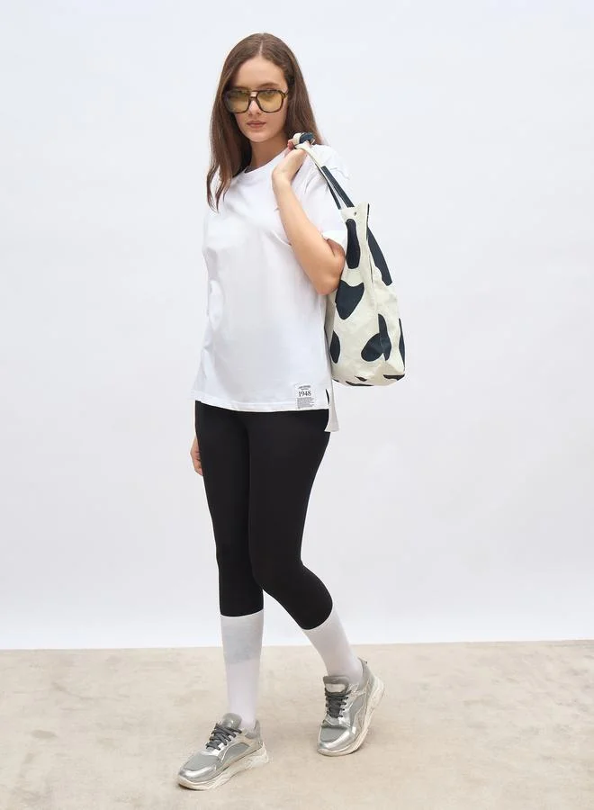ستايلي Styli High-Low Hem Oversized T-Shirt with Patch Detail
