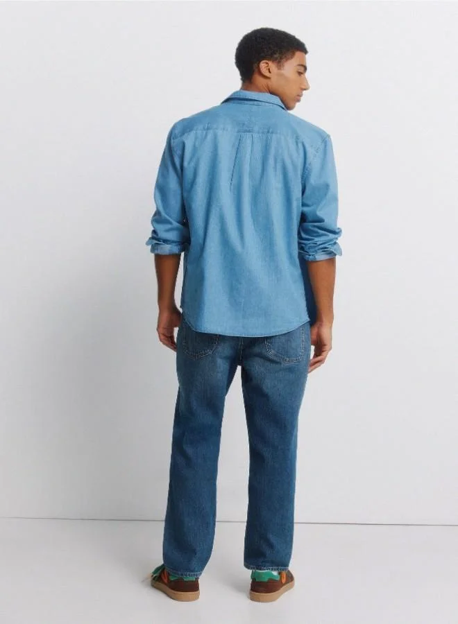 Springfield  Stretch regular fit 5-pocket comfort jeans with two-tone embroidered coin pocket detail, medium-dark wash, overdyed dirty effect, worn look and zip fly fastening. for Men | Best Price UAE