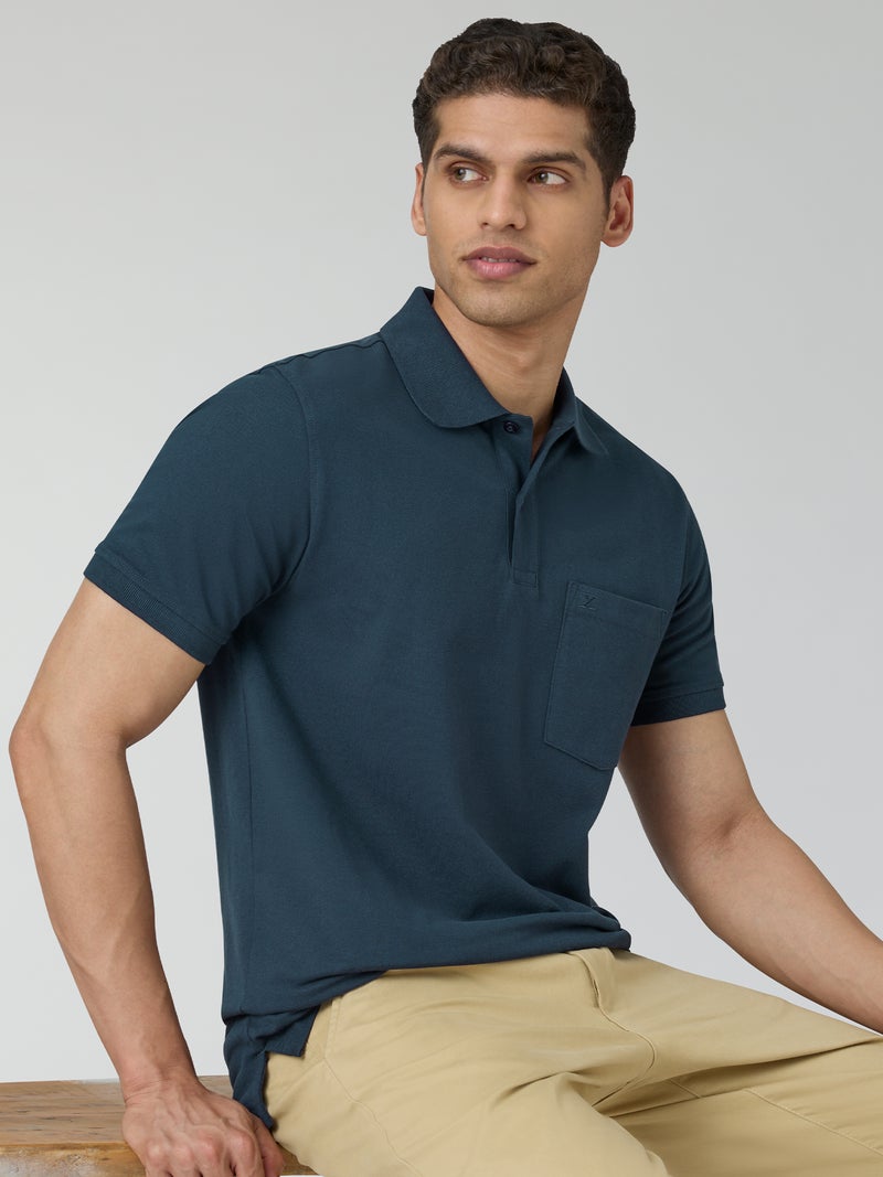 اكس واي اكس اكس تيشيرت بولو سادة من القطن بنصف كم للرجال باللون الأزرق الداكن - Image 4