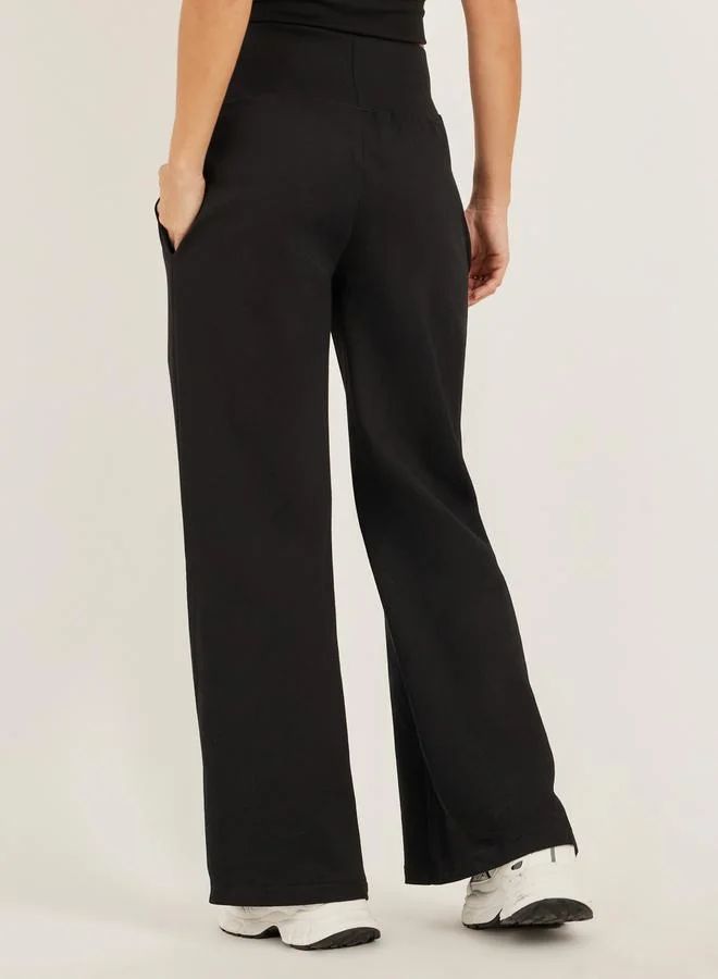 Styli Styli Badge Detail Wide Leg Joggers with Side Slit