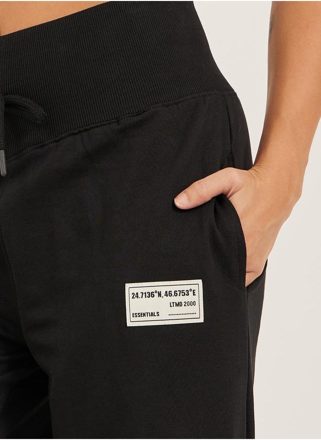 Styli Styli Badge Detail Wide Leg Joggers with Side Slit  - Image 4