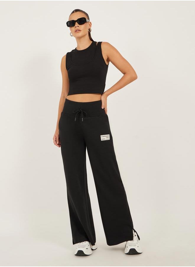 Styli Styli Badge Detail Wide Leg Joggers with Side Slit  - Image 2