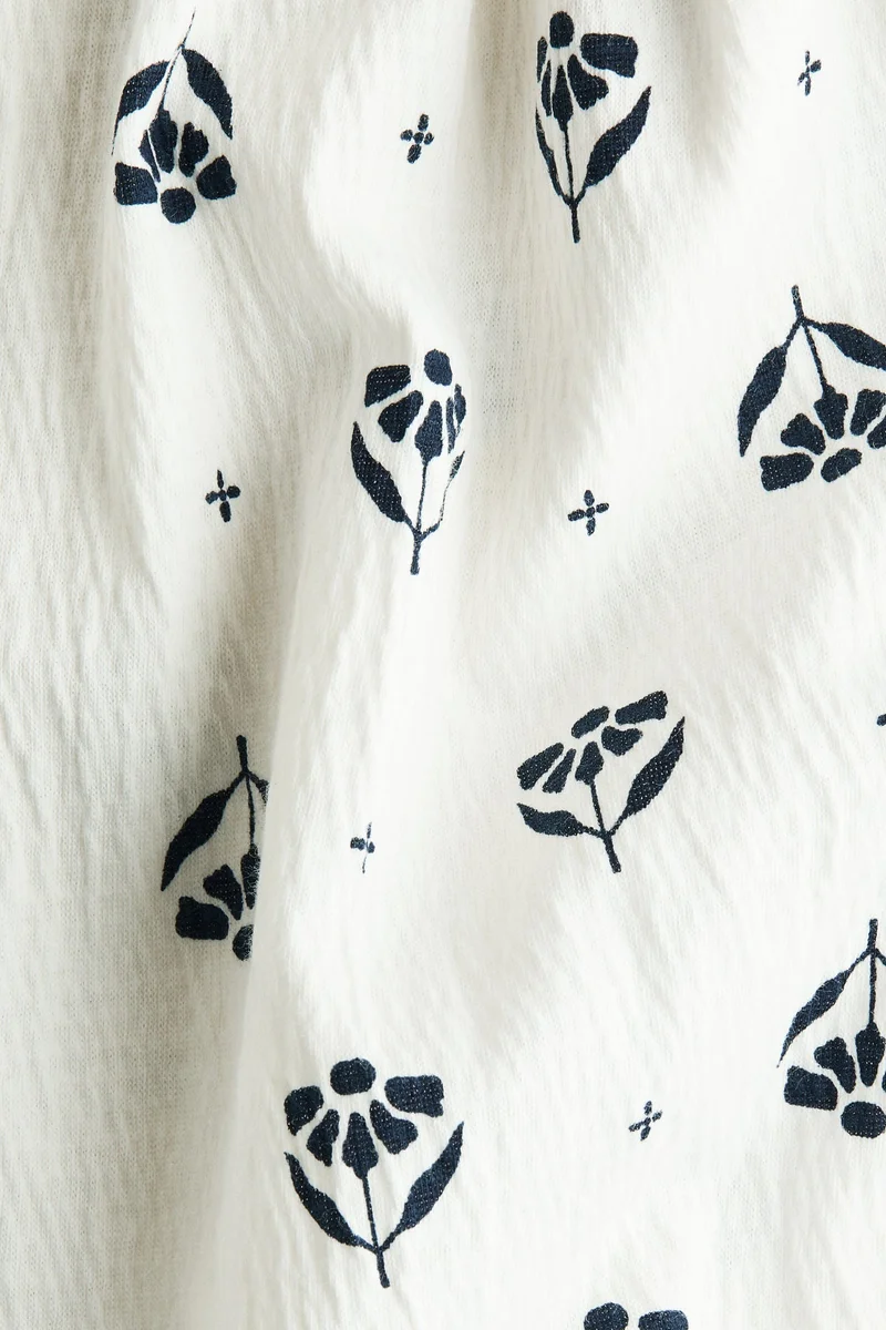 اتش اند ام فستان قطني بأكمام مكشكشة