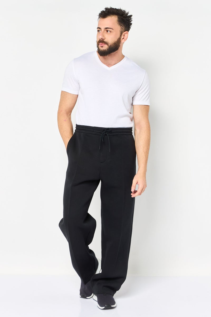 Nike Men Loose Fit Straight Leg Outdoor Sweatpants, Black - Image 2