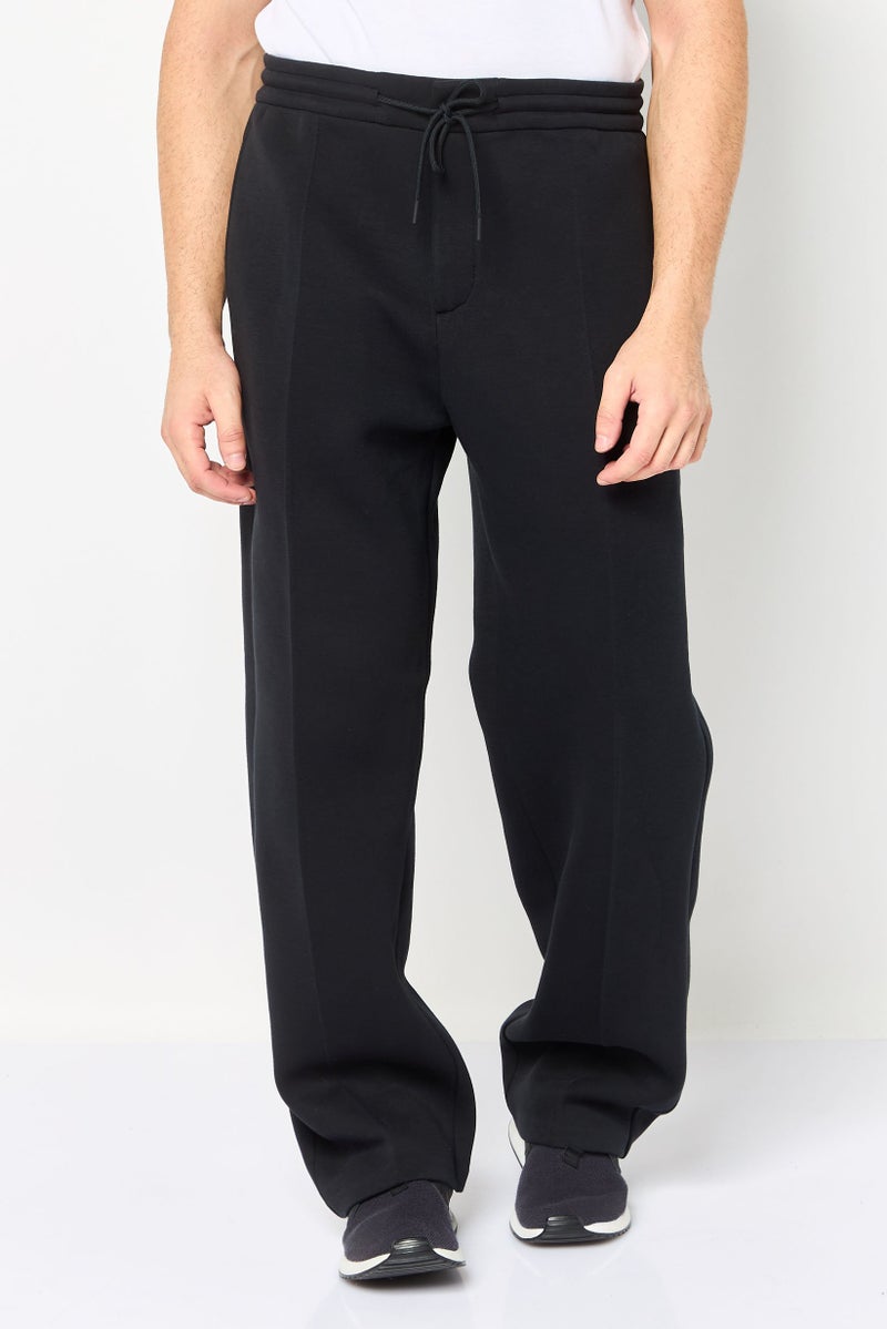 Nike Men Loose Fit Straight Leg Outdoor Sweatpants, Black - Image 1