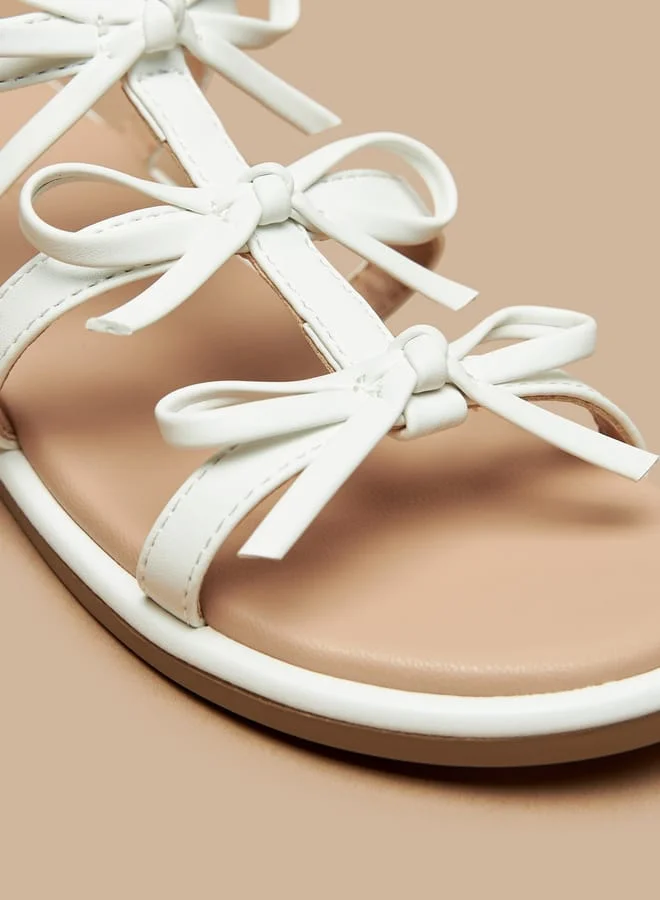 Flora Bella By Shoexpress Girls Bow Accent Flat Sandals with Buckle Closure