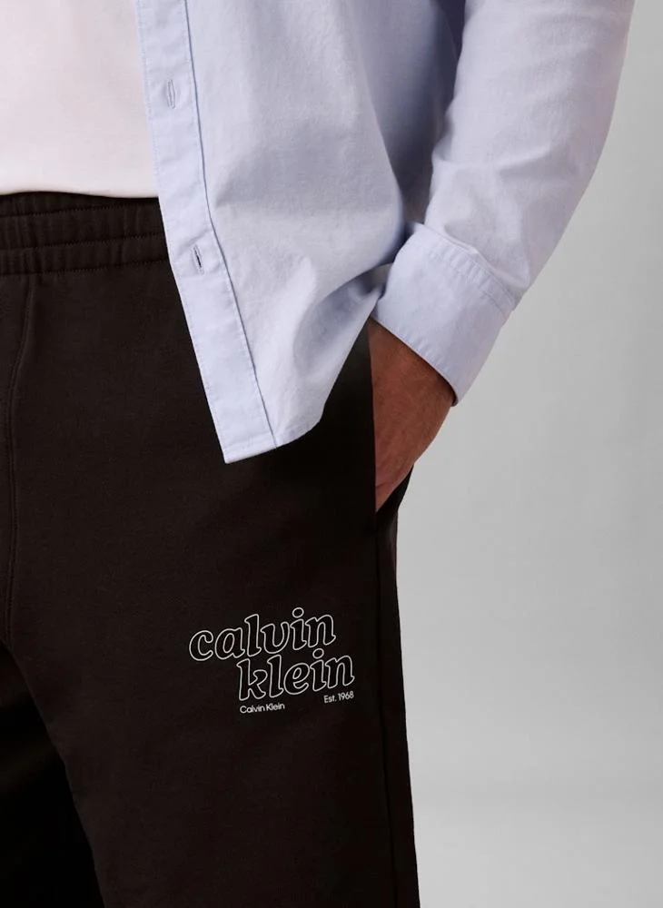 Calvin Klein Jeans Black Premium Terry Graphic Shorts for Men | Best Price UAE
