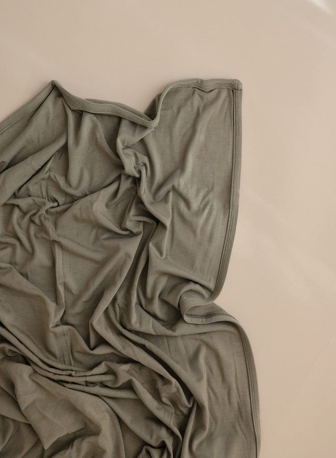 mushie Stretchy Baby Swaddle Blanket | Extra Soft & Snug Fit | 47"x47" (Dried Thyme) - Image 3