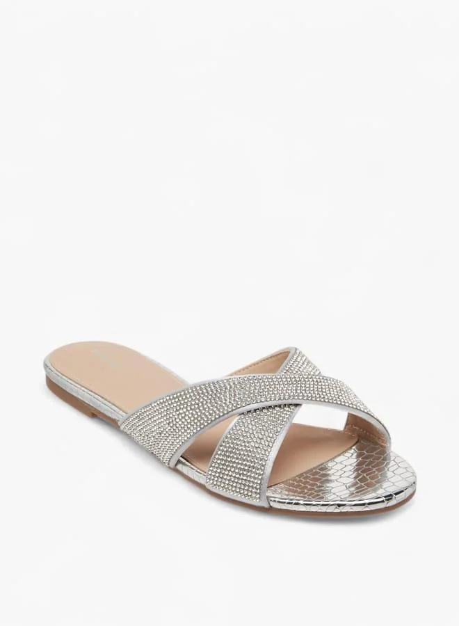 فلورا بيلا من شو إكسبرس صنادل نسائية مسطحة مزينة بأشرطة متقاطعة